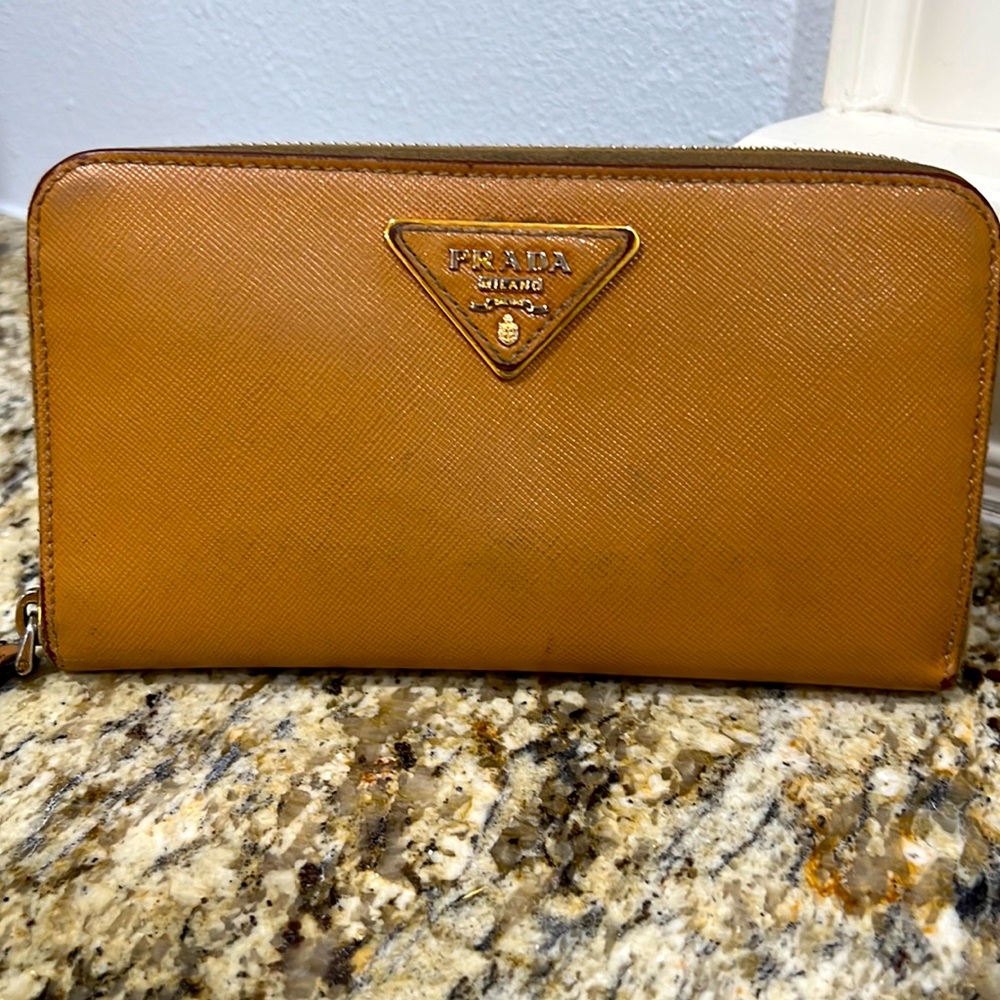 Prada tan leather zippy wallet